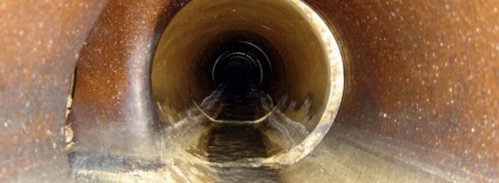 Camera view of the inside of a broken sewer line.